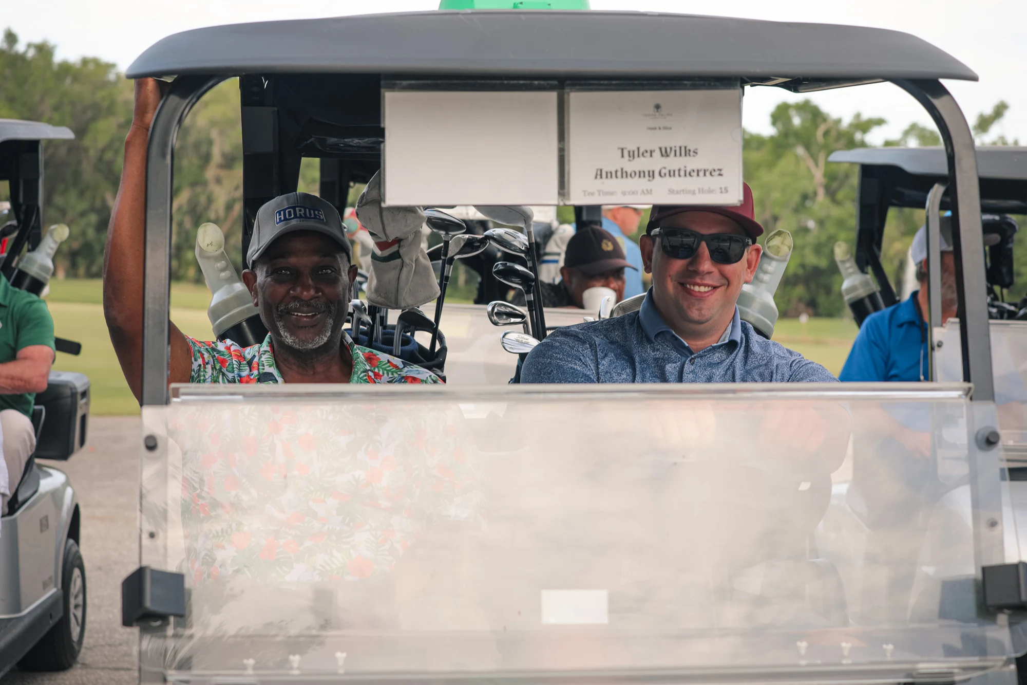 Golfers in a golf cart