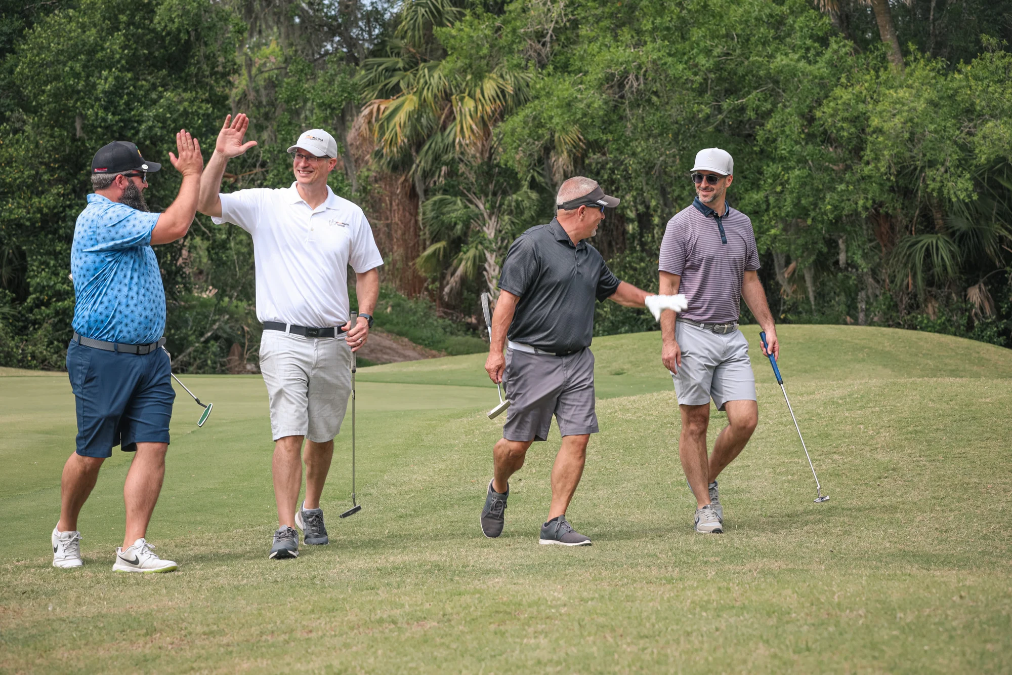 Golfers walking together on the course